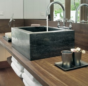 stone basin with bathroom mixer