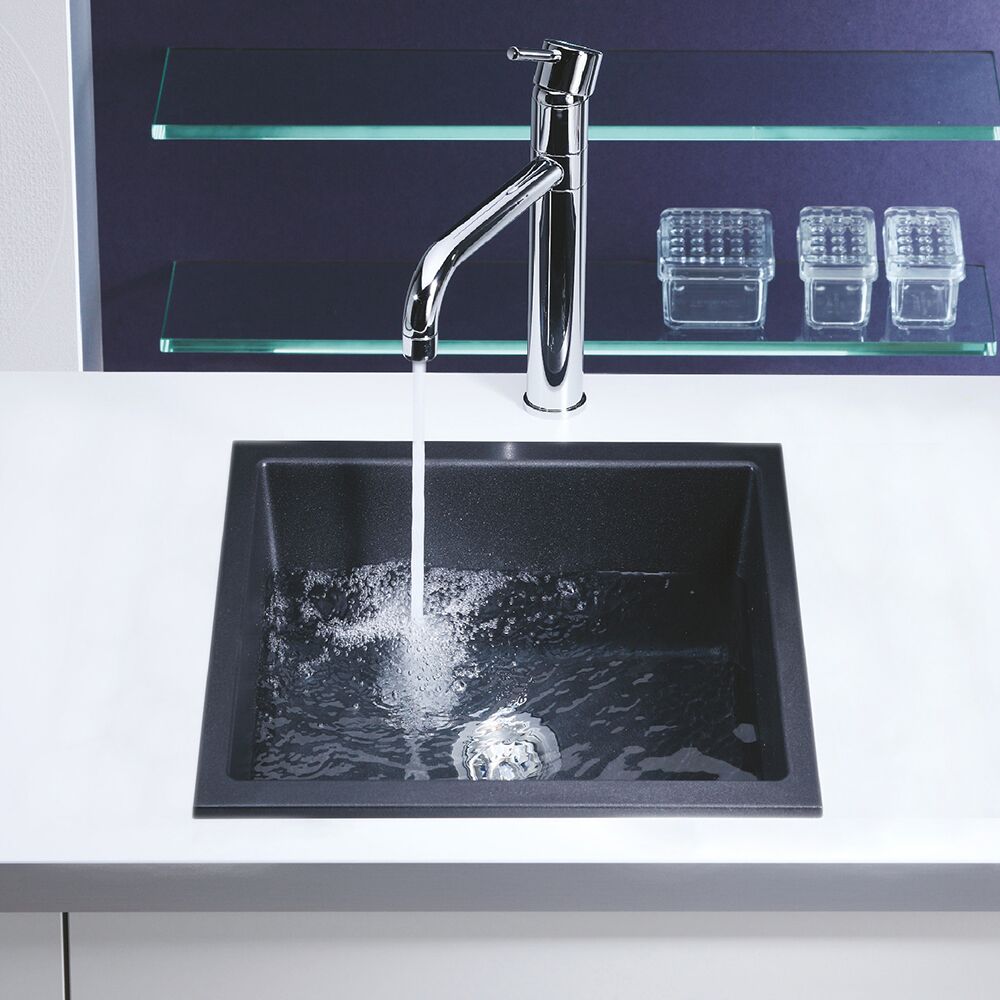 black granite kitchen sink in black and white kitchen