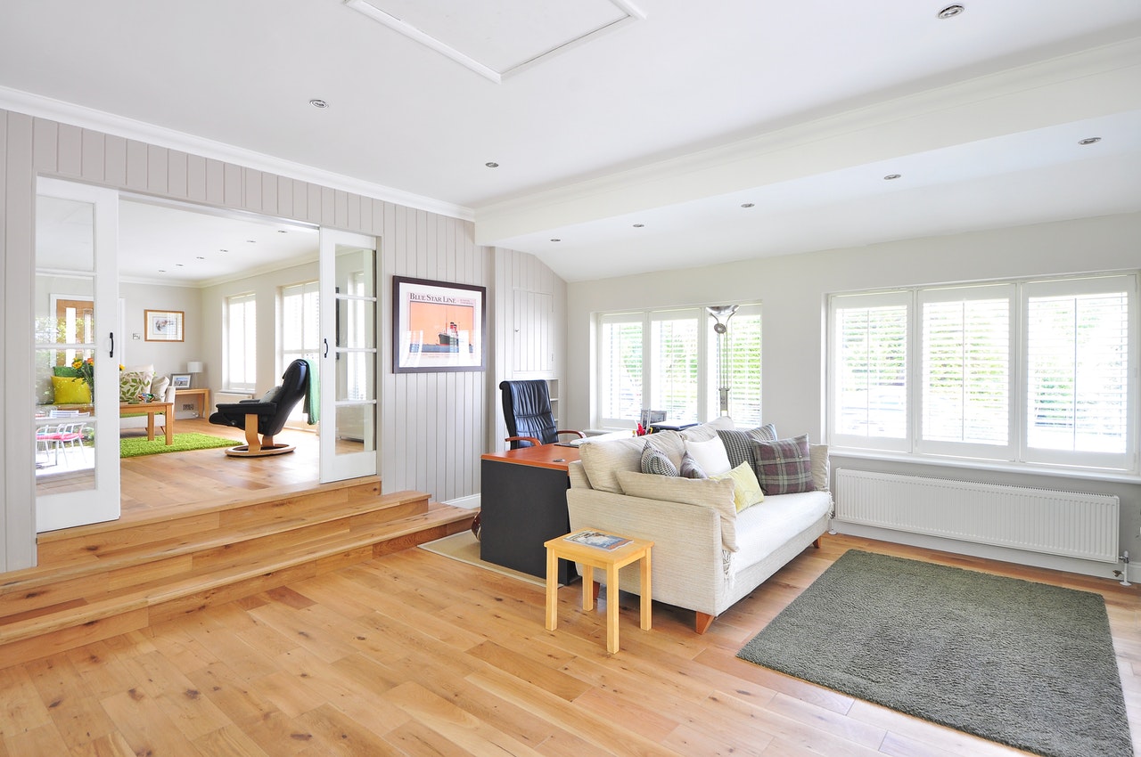 family room white ceiling walls wood floorboards grey carpet