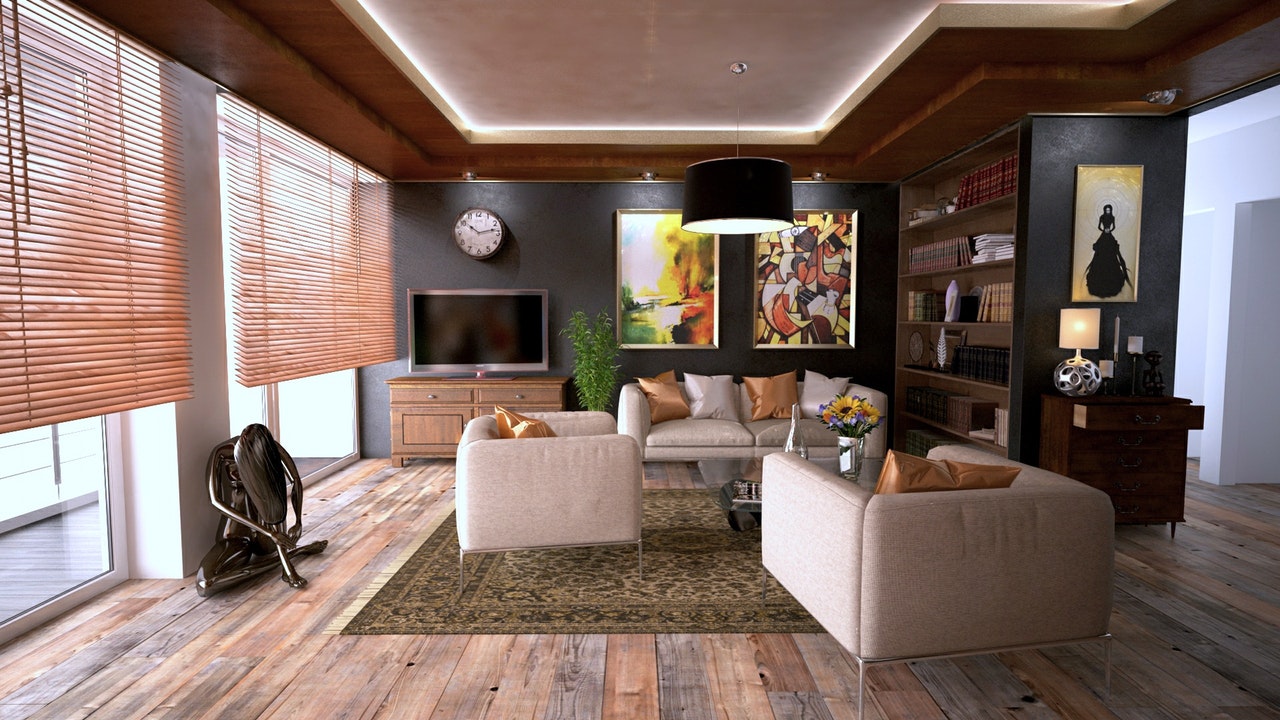 family room with bookshelves tv sofa sculpture lamp blinds carpet wooden floorboards
