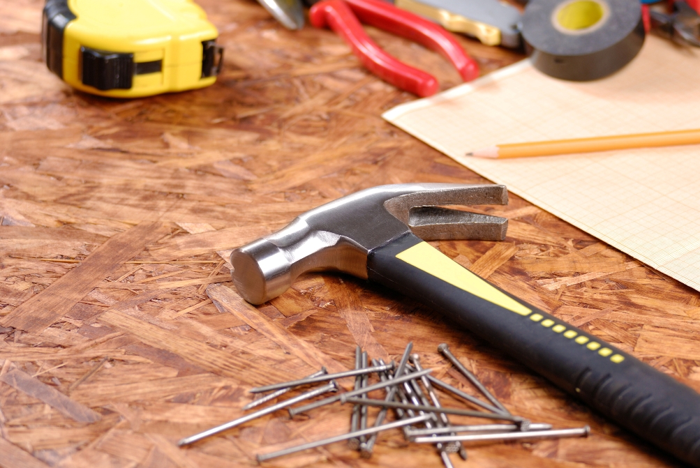 tools, hammer, nails on floor