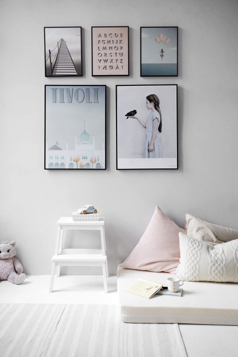 make a room look bigger room with framed wall decors