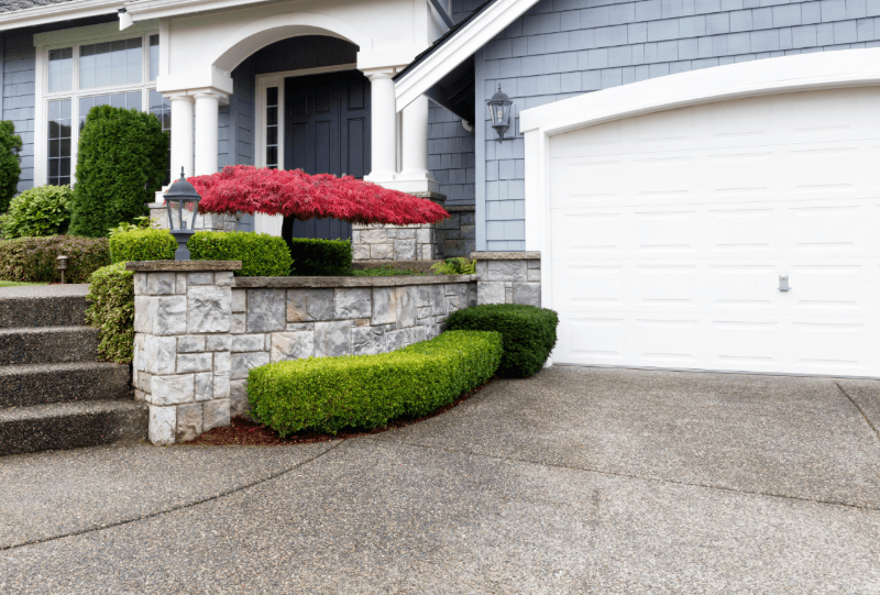 Garage Door White house with white garage door